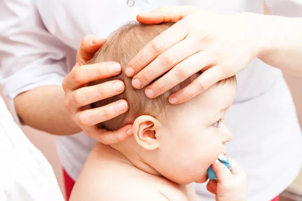 Massaging of baby's head